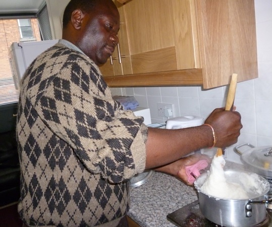 George Chileya cooking ‘nshima’ in Goldsmith Hall at TCD